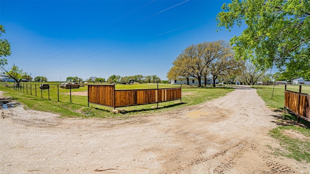 rear view of house with a yard and a patio