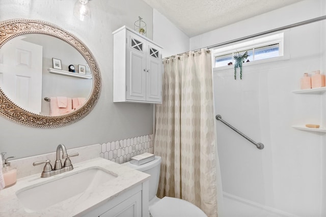 bathroom featuring a textured ceiling, vanity, tile walls, toilet, and a shower with shower curtain