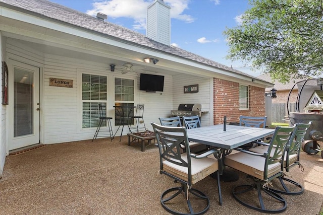 2905 Pueblo Dr, Waco, TX 76712 - view of patio featuring outdoor dining area, a grill, fence, and ceiling fan