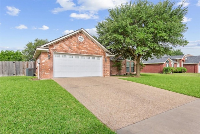 2905 Pueblo Dr, Waco, TX 76712 - view of front of home with cooling unit, brick siding, concrete driveway, and an attached garage