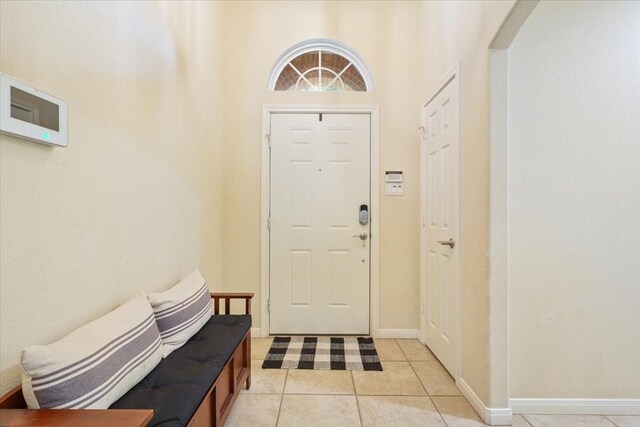 2905 Pueblo Dr, Waco, TX 76712 - foyer featuring a chandelier, light wood-style floors, and baseboards