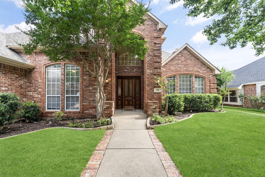 1104 Shadetree Ln, Allen, TX 75013 - property entrance with brick siding