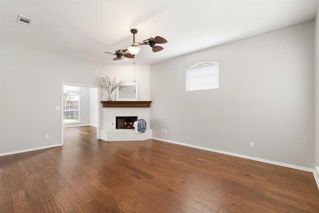 1104 Shadetree Ln, Allen, TX 75013 - view of property hidden behind natural elements with brick siding and a front yard