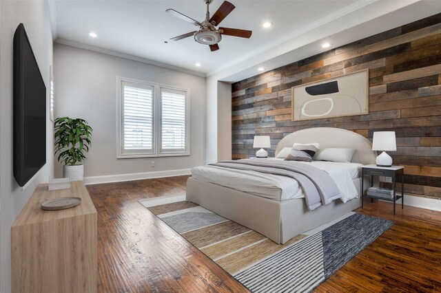 2110 Helsminster Dr, Dallas, TX 75201 - bedroom featuring an accent wall, wood walls, baseboards, ornamental molding, and wood finished floors