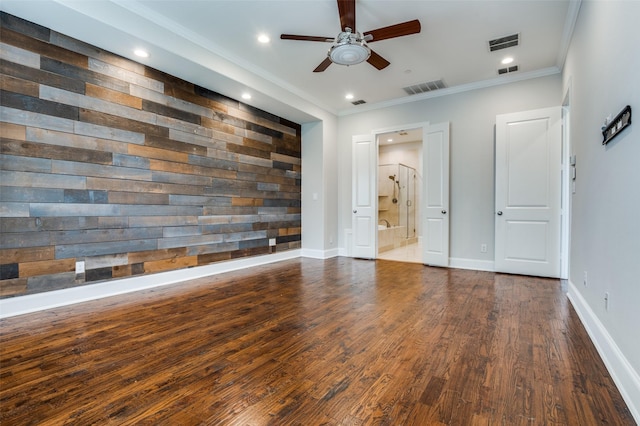 2110 Helsminster Dr, Dallas, TX 75201 - unfurnished bedroom with ornamental molding, wood finished floors, baseboards, connected bathroom, and recessed lighting