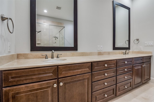 2110 Helsminster Dr, Dallas, TX 75201 - bathroom featuring double vanity, a stall shower, and tile patterned floors