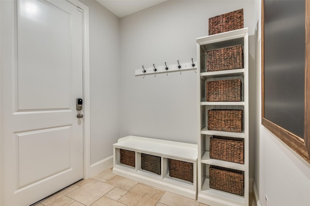 2110 Helsminster Dr, Dallas, TX 75201 - mudroom with baseboards and light tile patterned flooring