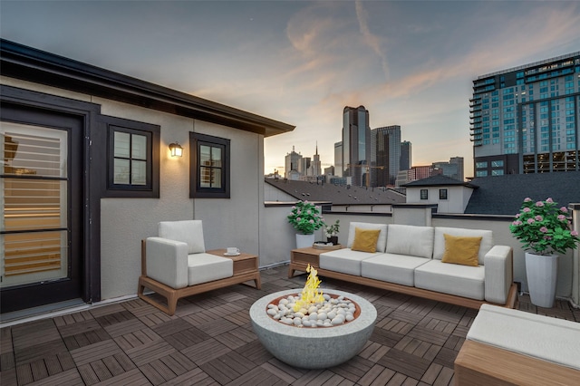 2110 Helsminster Dr, Dallas, TX 75201 - view of patio with an outdoor living space with a fire pit and a skyline view