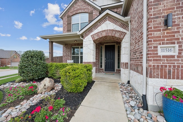 11516 Morrow Ln, Mckinney, TX 75071 - property entrance featuring brick siding and covered porch