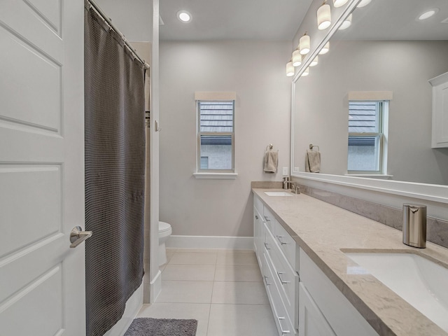 8505 Tierra Ct, Benbrook, TX 76126 - full bath featuring toilet, tile patterned floors, a sink, and double vanity