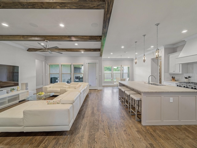 8505 Tierra Ct, Benbrook, TX 76126 - living area with dark wood finished floors, baseboards, recessed lighting, beamed ceiling, and a ceiling fan