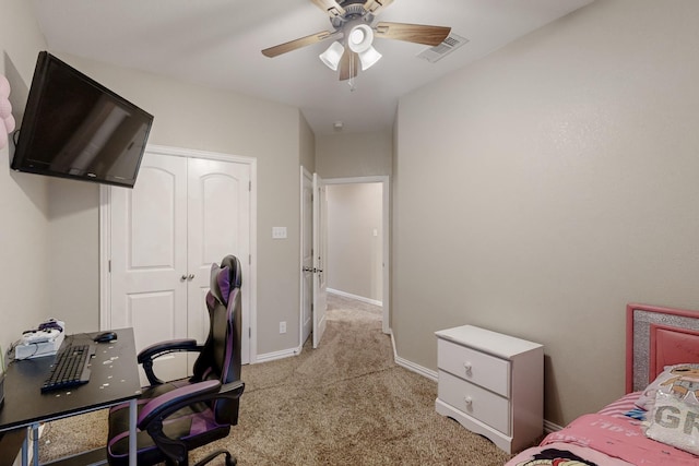 510 Springtime Dr, Cedar Hill, TX 75104 - bedroom with light carpet, a desk, a ceiling fan, a closet, and baseboards