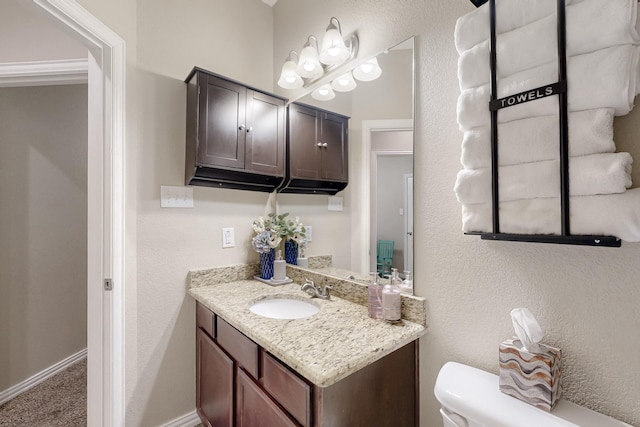 510 Springtime Dr, Cedar Hill, TX 75104 - half bathroom with vanity, toilet, and baseboards