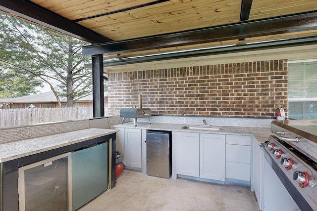 510 Springtime Dr, Cedar Hill, TX 75104 - view of patio / terrace featuring a sink and beverage cooler