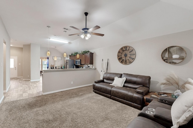 510 Springtime Dr, Cedar Hill, TX 75104 - living room featuring light colored carpet, ceiling fan, vaulted ceiling, and baseboards