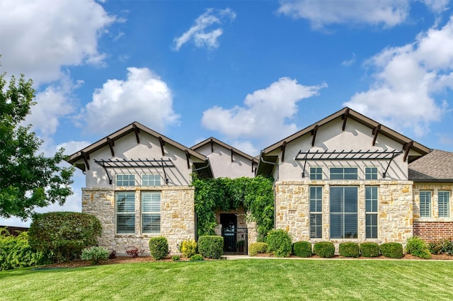 431 Lakepoint Cir, Prosper, TX 75078 - craftsman inspired home featuring stone siding, a pergola, stucco siding, and a front lawn