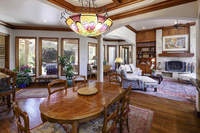 3636 Amherst Ave, University Park, TX 75225 - dining space featuring ornamental molding, decorative columns, ceiling fan, and arched walkways