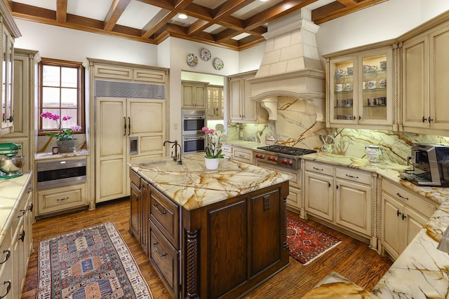 3636 Amherst Ave, University Park, TX 75225 - kitchen featuring light stone countertops, backsplash, beamed ceiling, stainless steel appliances, and cream cabinets