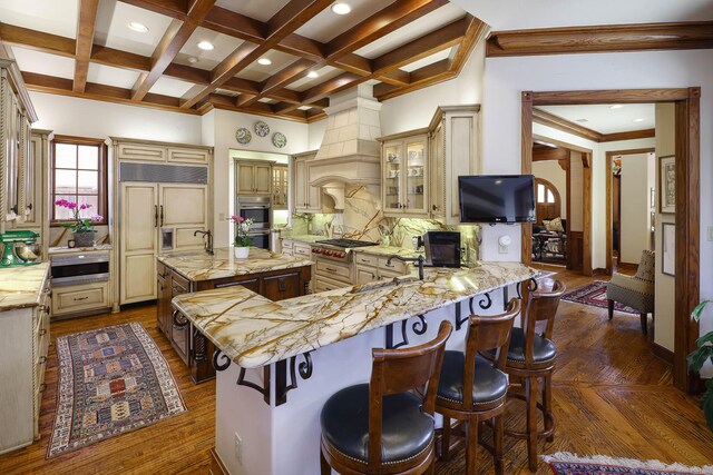3636 Amherst Ave, University Park, TX 75225 - kitchen featuring built in appliances, dark wood finished floors, cream cabinets, and a sink
