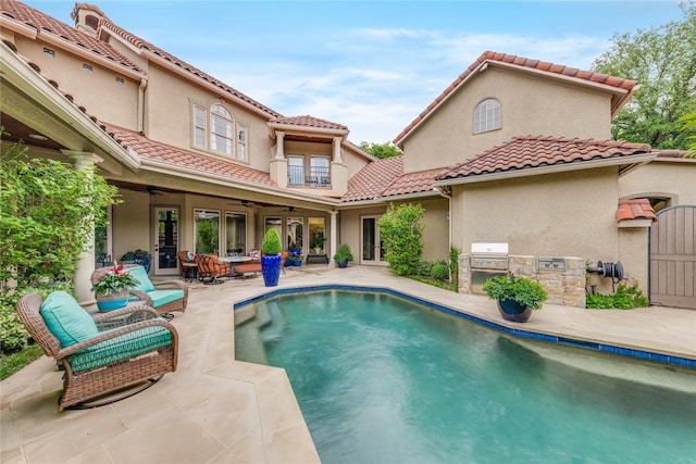 3636 Amherst Ave, University Park, TX 75225 - pool featuring a grill, ceiling fan, a patio area, and exterior kitchen