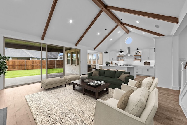 248 Diamond Dl, Lavon, TX 75166 - living room with beamed ceiling, high vaulted ceiling, recessed lighting, and wood finished floors