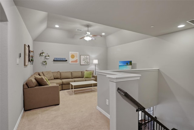 living area featuring light carpet, vaulted ceiling, visible vents, and recessed lighting