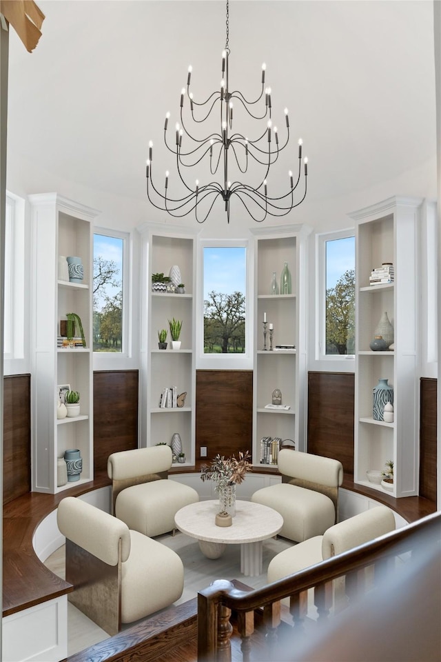 401 Lution Dr, Weatherford, TX 76087 - sitting room with a chandelier, plenty of natural light, and wood finished floors