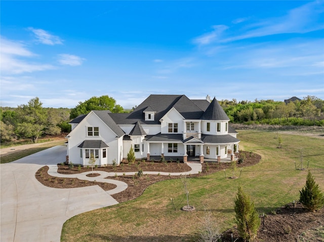 401 Lution Dr, Weatherford, TX 76087 - view of front facade with a porch, a front lawn, and curved driveway