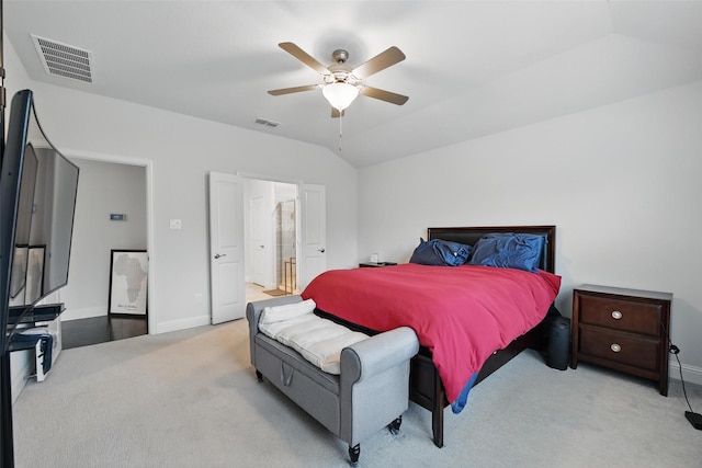 bedroom with visible vents, carpet floors, baseboards, and lofted ceiling
