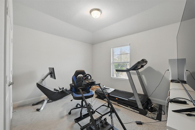workout room with carpet flooring and baseboards