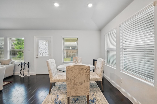 dining area featuring baseboards, recessed lighting, vaulted ceiling, and dark wood finished floors
