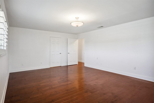 5111 Cimmaron Cir, Parker, TX 75002 - empty room with dark wood finished floors and baseboards