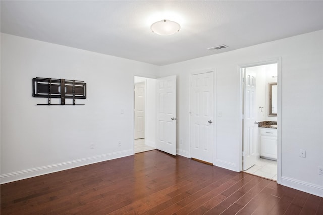 5111 Cimmaron Cir, Parker, TX 75002 - unfurnished bedroom with dark wood-type flooring, baseboards, and ensuite bath