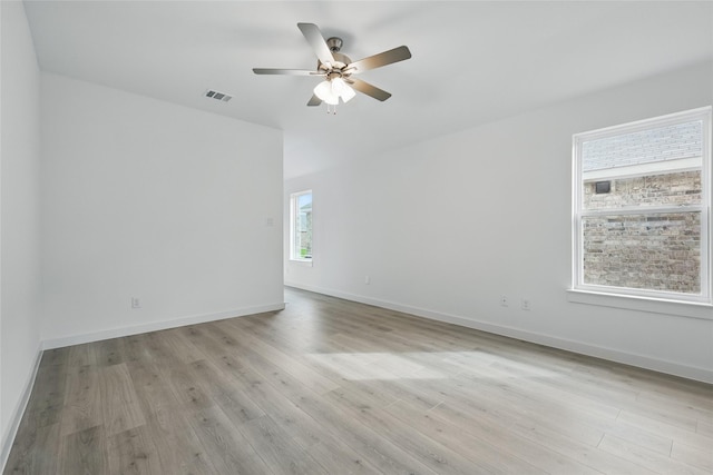 1321 Cider St, Forney, TX 75126 - spare room with a ceiling fan, baseboards, visible vents, and light wood-style floors