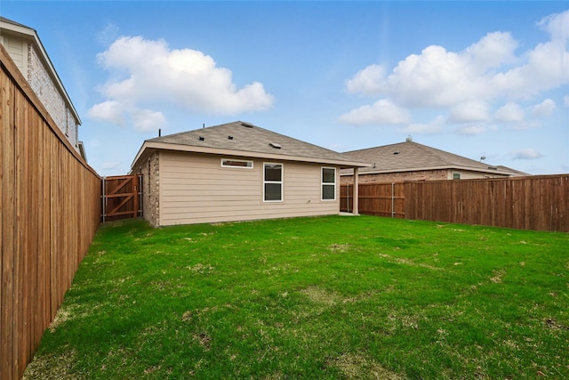 1321 Cider St, Forney, TX 75126 - rear view of house with a fenced backyard and a yard
