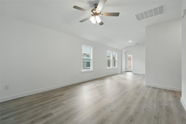 1321 Cider St, Forney, TX 75126 - unfurnished living room with a wealth of natural light, light wood finished floors, and visible vents
