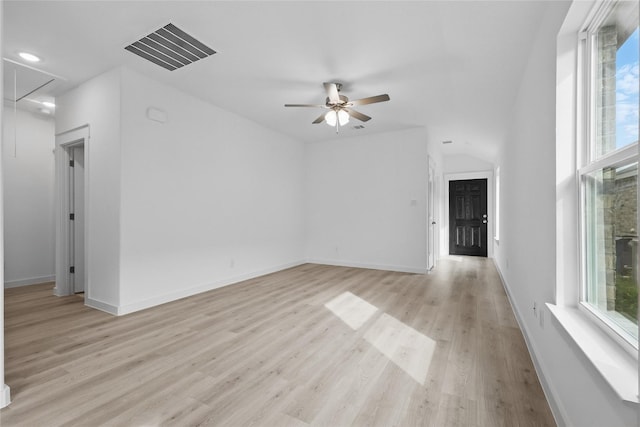 1321 Cider St, Forney, TX 75126 - unfurnished living room featuring visible vents, attic access, plenty of natural light, and ceiling fan