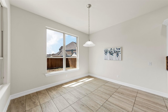 971 Abbott Ln, Allen, TX 75013 - unfurnished dining area with baseboards