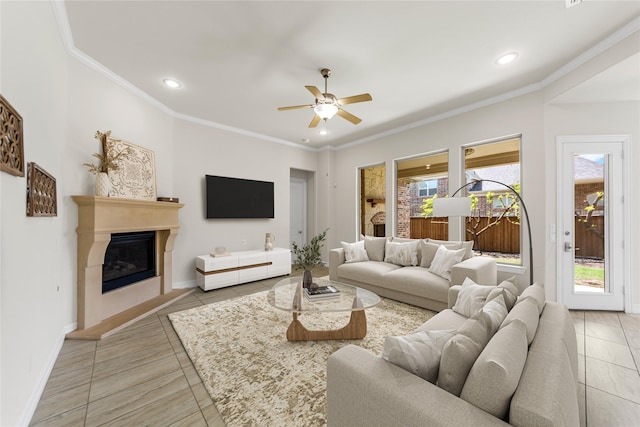 971 Abbott Ln, Allen, TX 75013 - living area with light tile patterned floors, a ceiling fan, recessed lighting, baseboards, and crown molding