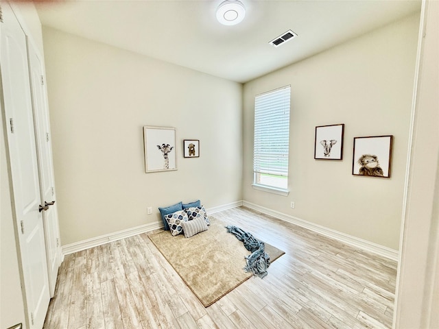 971 Abbott Ln, Allen, TX 75013 - workout room with light wood finished floors and baseboards