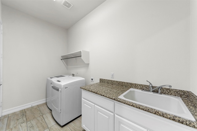 971 Abbott Ln, Allen, TX 75013 - washroom with cabinet space, separate washer and dryer, and baseboards