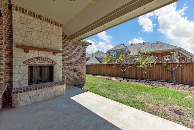 971 Abbott Ln, Allen, TX 75013 - fenced backyard with a patio area and a residential view