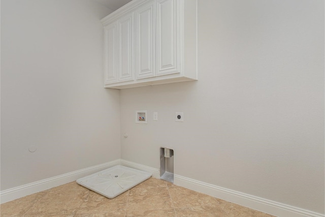 9108 Blue Water Dr, Plano, TX 75025 - laundry area with baseboards, gas dryer hookup, cabinet space, electric dryer hookup, and hookup for a washing machine