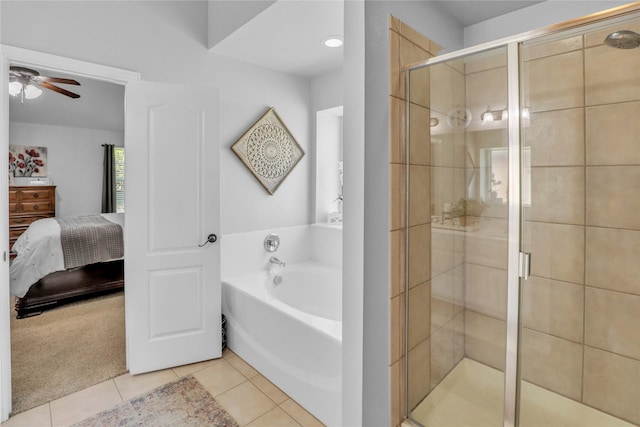 full bathroom featuring ceiling fan, connected bathroom, a bath, tile patterned flooring, and a stall shower