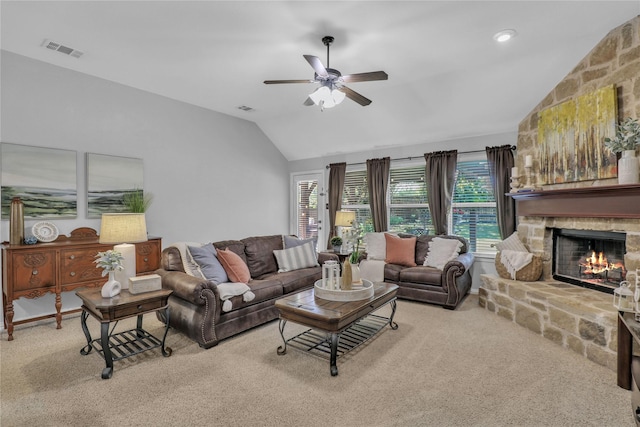 living room featuring carpet, visible vents, vaulted ceiling, and ceiling fan