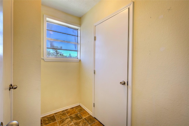 interior space with baseboards
