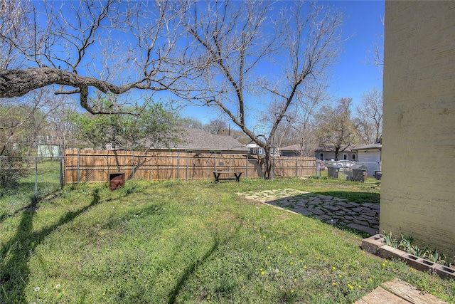view of yard with fence