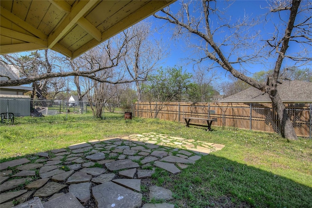 view of yard featuring a fenced backyard and a patio