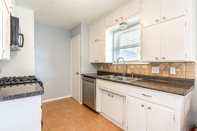 kitchen featuring dark countertops, dishwasher, a sink, and black microwave