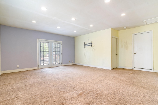 unfurnished room with recessed lighting, french doors, baseboards, and carpet floors
